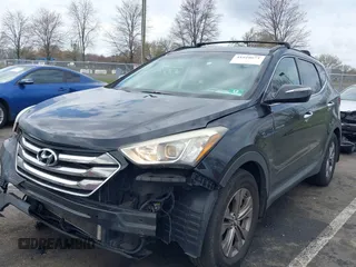 2014 Hyundai Santa Fe z VIN 5XYZUDLBXEG162476, wystawiony jako IAAI lot #41910671 z przebiegiem 146 607 mil mil oraz . Historia ofert i sprzedaży dostępna na DreamBid. Obrazek 2.