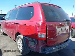 2012 Kia Sedona LX with VIN KNDMG4C70C6443649, listed as a IAAI auction lot 41662007 with 208,575 mi miles. Bid and sale history available at carsss.com. Image 3.