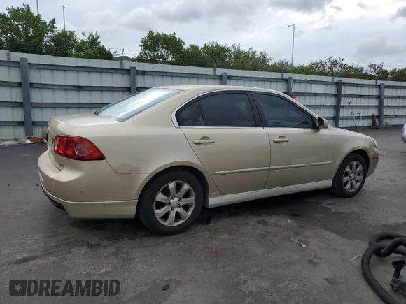2008 Kia Optima LX z VIN KNAGE124385198719, wystawiony jako Copart lot #55449255 z przebiegiem 156 972 mil mil oraz Szkoda całkowita • Salvage title. Historia ofert i sprzedaży dostępna na DreamBid. Obrazek 3.