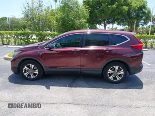 2019 Honda CR-V LX z VIN 2HKRW5H32KH409284, wystawiony jako IAAI lot #42469438 z przebiegiem 143 379 mil mil oraz . Historia ofert i sprzedaży dostępna na DreamBid. Obrazek 14.