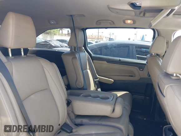 2020 Honda Odyssey Touring with VIN 5FNRL6H81LB028083, listed as a IAAI auction lot 42003810 with 71,536 mi miles and . Bid and sale history available at DreamBid. Image 8.