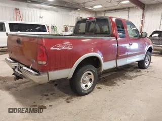 2003 Ford F-150 XL with VIN 1FTRX18L33NB82694, listed as a IAAI auction lot 41612431 with 179,664 mi miles. Bid and sale history available at carsss.com. Image 4.