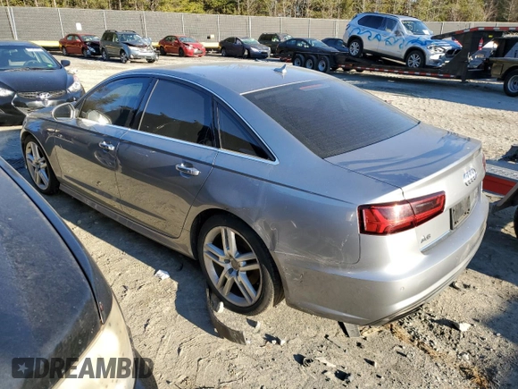 2016 Audi A6 3.0L TDI Prestige with VIN WAUHMAFC6GN009729, listed as a Copart auction lot 72777562 with 107,933 mi miles. Bid and sale history available at carsss.com. Image 2.