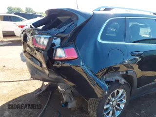 2019 Jeep Cherokee Latitude Plus with VIN 1C4PJLLB3KD223431, listed as a IAAI auction lot 40377530 with 123,575 mi miles. Bid and sale history available at carsss.com. Image 6.