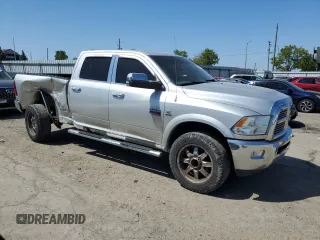 2012 Ram 2500 Laramie z VIN 3C6UD5FL7CG281418, wystawiony jako Copart lot #56425245 z przebiegiem 146 938 mil mil oraz Szkoda całkowita • Salvage title. Historia ofert i sprzedaży dostępna na DreamBid. Obrazek 4.