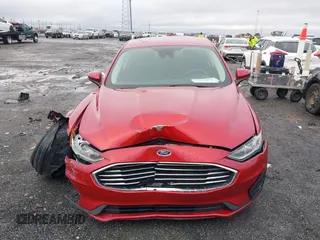 2020 Ford Fusion SE z VIN 3FA6P0T97LR234873, wystawiony jako IAAI lot #41510333 z przebiegiem 65 243 mil mil oraz . Historia ofert i sprzedaży dostępna na DreamBid. Obrazek 12.