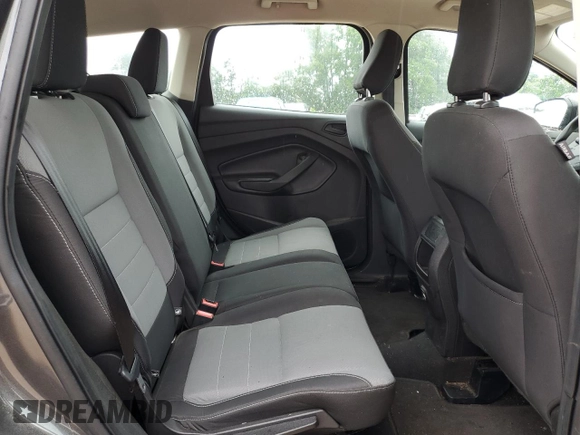 2019 Ford Escape S z VIN 1FMCU0F75KUA87696, wystawiony jako Copart lot #56312775 z przebiegiem 84 472 mil mil oraz Szkoda całkowita • Salvage title. Historia ofert i sprzedaży dostępna na DreamBid. Obrazek 11.