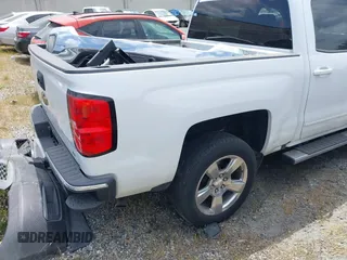 2017 Chevrolet Silverado 1500 LT with VIN 3GCPCRECXHG344049, listed as a IAAI auction lot 41803518 with 205,643 mi miles. Bid and sale history available at carsss.com. Image 4.