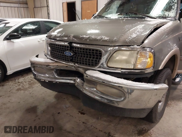 1999 Ford Expedition XLT z VIN 1FMPU18LXXLB47700, wystawiony jako IAAI lot #41592004 z przebiegiem Nie podano mil oraz . Historia ofert i sprzedaży dostępna na DreamBid. Obrazek 6.