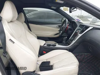 2017 Infiniti Q60 Red Sport 400 with VIN JN1FV7EK8HM610878, listed as a IAAI auction lot 41912063 with 93,680 mi miles and . Bid and sale history available at carsss.com. Image 5.