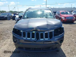 2017 Jeep Compass Sport SE z VIN 1C4NJDBB3HD143859, wystawiony jako IAAI lot #42784214 z przebiegiem 82 815 mil mil oraz . Historia ofert i sprzedaży dostępna na DreamBid. Obrazek 13.