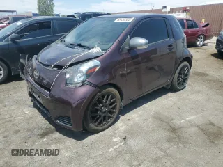 2014 Scion iQ with VIN JTNJJXB04EJ029246, listed as a Copart auction lot 58450364 with 0 mi miles and Salvage Title. Bid and sale history available at carsss.com. Image 1.