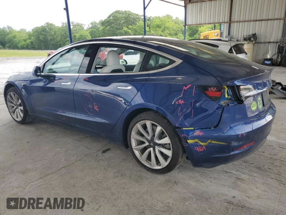 2019 Tesla Model 3 Mid Range z VIN 5YJ3E1EA1KF417900, wystawiony jako Copart lot #55310265 z przebiegiem 45 739 mil mil oraz Szkoda całkowita • Salvage title. Historia ofert i sprzedaży dostępna na DreamBid. Obrazek 2.