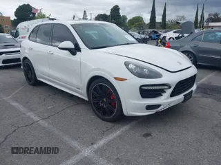 2013 Porsche Cayenne GTS with VIN WP1AD2A20DLA79077, listed as a IAAI auction lot 41787229 with 131,055 mi miles and . Bid and sale history available at DreamBid. Image 1.