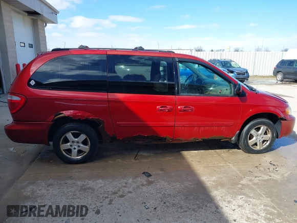 2005 Dodge Grand Caravan with VIN 2D4G944L75R310409, listed as a IAAI auction lot 41781132 with 128,120 mi miles and . Bid and sale history available at DreamBid. Image 13.