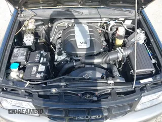 2001 Isuzu Rodeo S z VIN 4S2CK58W914361058, wystawiony jako IAAI lot #42404904 z przebiegiem 125 945 mil mil oraz . Historia ofert i sprzedaży dostępna na DreamBid. Obrazek 10.