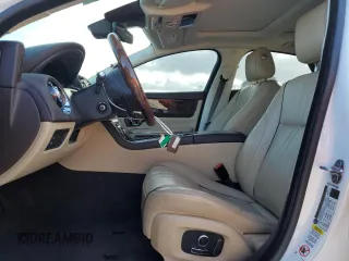 2018 Jaguar XJ with VIN SAJWA1C77J8W14750, listed as a Copart auction lot 87273204 with 51,040 mi miles and Clean Title. Bid and sale history available at carsss.com. Image 7.