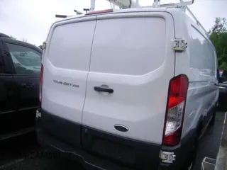2016 Ford Transit Cargo with VIN 1FTYR1ZM4GKA09500, listed as a IAAI auction lot 42304806 with 186,333 mi miles and . Bid and sale history available at DreamBid. Image 22.