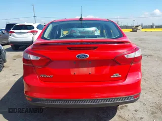 2012 Ford Focus SE with VIN 1FAHP3F27CL417875, listed as a IAAI auction lot 42128614 with 56,961 mi miles. Bid and sale history available at carsss.com. Image 16.