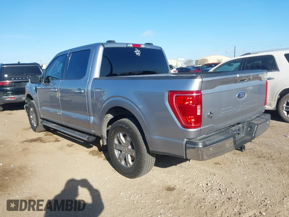 2021 Ford F-150 XL with VIN 1FTEW1CP3MFC30671, listed as a IAAI auction lot 41670207 with 56,540 mi miles. Bid and sale history available at carsss.com. Image 3.