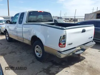 1999 Ford F-150 with VIN 1FTZX1720XKB31945, listed as a IAAI auction lot 42123984 with 187,766 mi miles and . Bid and sale history available at DreamBid. Image 3.