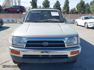 1997 Toyota 4Runner Limited with VIN JT3GN87RXV0024918, listed as a IAAI auction lot 42032378 with 173,784 mi miles. Bid and sale history available at carsss.com. Image 6.