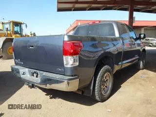 2010 Toyota Tundra 4WD Truck with VIN 5TFUY5F18AX111590, listed as a IAAI auction lot 41725142 with 116,360 mi miles. Bid and sale history available at carsss.com. Image 4.