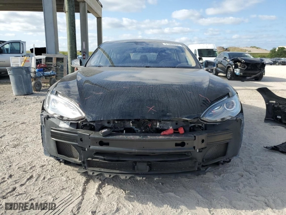 2015 Tesla Model S 85 kWh Battery with VIN 5YJSA1S12FFP67764, listed as a Copart auction lot 51000664 with 70,034 mi miles. Bid and sale history available at carsss.com. Image 5.