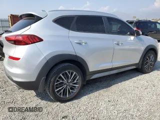 2019 Hyundai Tucson SEL with VIN KM8J33AL7KU841214, listed as a Copart auction lot 59331185 with 99,150 mi miles and Salvage title. Bid and sale history available at DreamBid. Image 3.