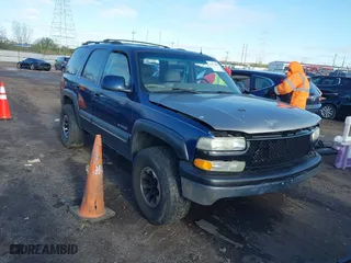 2002 Chevrolet Tahoe LT with VIN 1GNEK13Z42J140816, listed as a IAAI auction lot 41973686 with 241,722 mi miles. Bid and sale history available at carsss.com. Image 1.