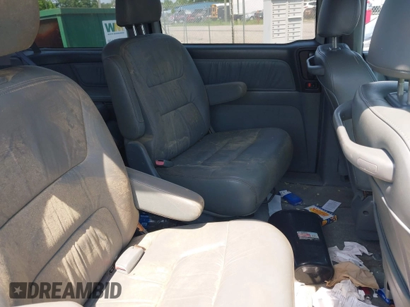 2004 Honda Odyssey EX-L with VIN 5FNRL18964B069905, listed as a IAAI auction lot 42583728 with 217,237 mi miles and . Bid and sale history available at DreamBid. Image 8.