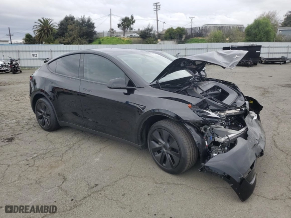 2025 Tesla Model Y Long Range with VIN 7SAYGDEE6SF308226, listed as a Copart auction lot 48006865 with 2,291 mi miles and Salvage Title. Bid and sale history available at carsss.com. Image 4.