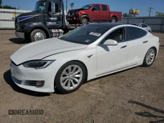 2017 Tesla Model S 100D z VIN 5YJSA1E22HF228827, wystawiony jako Copart lot #52934995 z przebiegiem 99 928 mil mil oraz Szkoda całkowita • Salvage title. Historia ofert i sprzedaży dostępna na DreamBid. Obrazek 1.