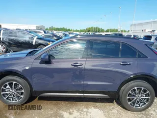 2024 Cadillac XT4 FWD Sport with VIN 1GYFZER40RF226384, listed as a IAAI auction lot 42220804 with 8,743 mi miles and . Bid and sale history available at DreamBid. Image 15.