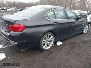 2015 BMW 5 Series 535i xDrive with VIN WBA5B3C58FD540350, listed as a IAAI auction lot 41551064 with 999,999 mi miles. Bid and sale history available at carsss.com. Image 4.