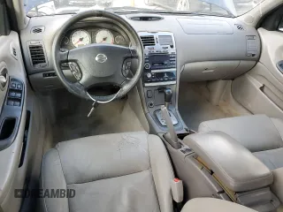 2003 Nissan Maxima SE z VIN JN1DA31A33T434264, wystawiony jako Copart lot #42189665 z przebiegiem 230 582 mil mil oraz Czysty tytuł • Clean title. Historia ofert i sprzedaży dostępna na DreamBid. Obrazek 8.
