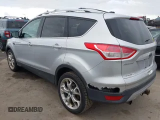 2013 Ford Escape Titanium с VIN 1FMCU9J91DUA13353, выставлен на аукционе IAAI как лот 42074045 с пробегом 108 452 миль миль и . История ставок и продаж доступна на DreamBid. Изображение 3.