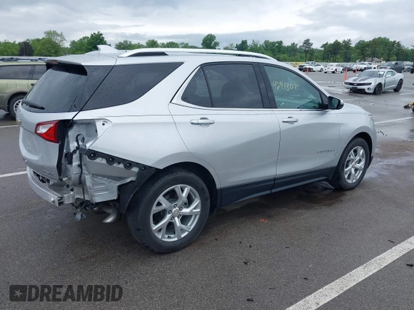 2021 Chevrolet Equinox Premier with VIN 3GNAXNEV4MS153066, listed as a IAAI auction lot 42413071 with 43,052 mi miles and . Bid and sale history available at DreamBid. Image 4.