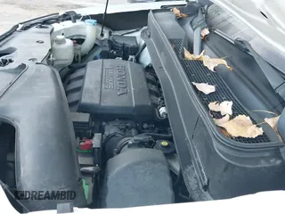 2013 Honda Pilot EX-L z VIN 5FNYF4H66DB082647, wystawiony jako IAAI lot #43353282 z przebiegiem 166 423 mil mil oraz . Historia ofert i sprzedaży dostępna na DreamBid. Obrazek 22.