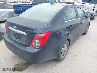 2015 Chevrolet Sonic LT with VIN 1G1JC5SH9F4127898, listed as a IAAI auction lot 41976381 with 148,658 mi miles. Bid and sale history available at carsss.com. Image 4.