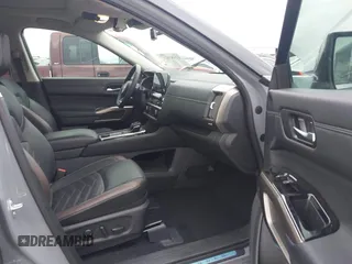 2024 Nissan Pathfinder Platinum z VIN 5N1DR3DKXRC244704, wystawiony jako IAAI lot #41983121 z przebiegiem 23 111 mil mil oraz . Historia ofert i sprzedaży dostępna na DreamBid. Obrazek 5.
