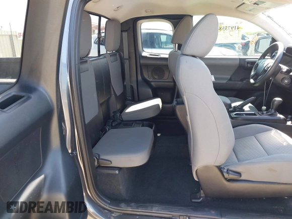 2020 Toyota Tacoma SR with VIN 3TYRX5GNXLT002488, listed as a IAAI auction lot 41973584 with 76,169 mi miles and . Bid and sale history available at DreamBid. Image 8.