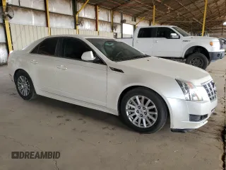2012 Cadillac CTS with VIN 1G6DA5E52C0131731, listed as a Copart auction lot 59223235 with 104,521 mi miles and Salvage title. Bid and sale history available at DreamBid. Image 4.