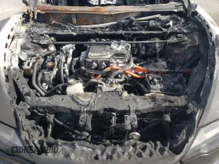 2024 Lexus RZ 300e Premium z VIN JTJABABB0RA004671, wystawiony jako Copart lot #57287935 z przebiegiem Nie podano mil oraz Nie do naprawy • Non repairable. Historia ofert i sprzedaży dostępna na DreamBid. Obrazek 12.