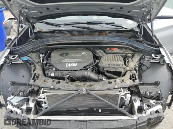 2018 BMW X1 sDrive28i z VIN WBXHU7C32J3H44095, wystawiony jako Copart lot #53780865 z przebiegiem Nie podano mil oraz Szkody całkowita. Historia ofert i sprzedaży dostępna na DreamBid. Obrazek 12.