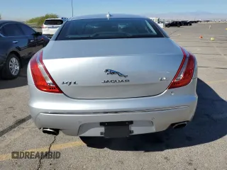 2015 Jaguar XJ with VIN SAJWA2GZ4F8V90853, listed as a Copart auction lot 72631114 with 59,237 mi miles and Salvage Title. Bid and sale history available at carsss.com. Image 6.