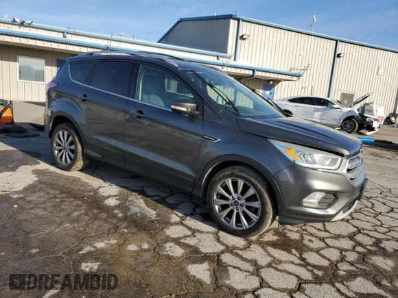 2017 Ford Escape Titanium with VIN 1FMCU0JD6HUB48690, listed as a Copart auction lot 45940845 with 160,296 mi miles and Salvage Title. Bid and sale history available at carsss.com. Image 4.