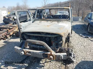 2013 Jeep Wrangler Unlimited Sport z VIN 1C4BJWDG5DL591947, wystawiony jako IAAI lot #41753728 z przebiegiem Nie podano mil oraz . Historia ofert i sprzedaży dostępna na DreamBid. Obrazek 6.