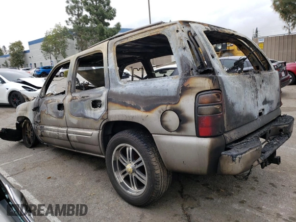 2005 GMC Yukon SLT z VIN 1GKEC13T25J236664, wystawiony jako Copart lot #51298885 z przebiegiem Nie podano mil oraz Nie do naprawy • Non repairable. Historia ofert i sprzedaży dostępna na DreamBid. Obrazek 2.