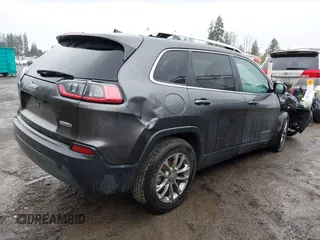 2020 Jeep Cherokee Altitude with VIN 1C4PJLLB9LD657063, listed as a IAAI auction lot 41977009 with 72,215 mi miles and . Bid and sale history available at carsss.com. Image 4.